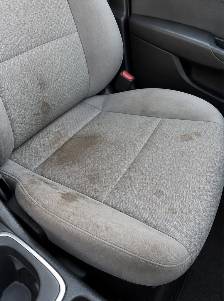 Illustrative car seat before cleaning